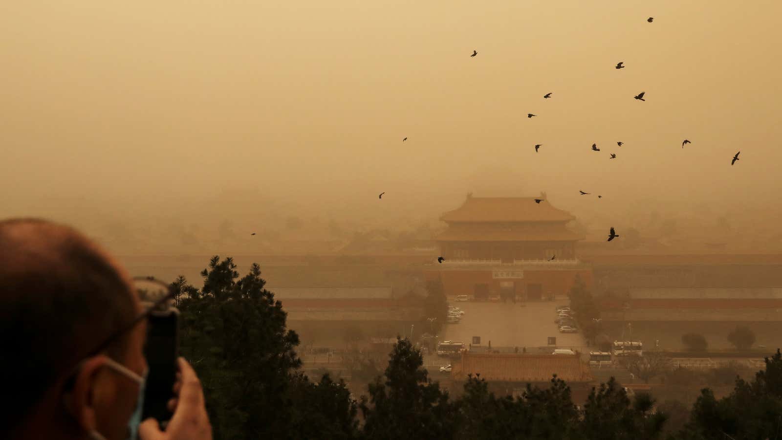 Beijing has been hit by two massive sandstorms within two weeks, turning the sky yellow and the sun blue.