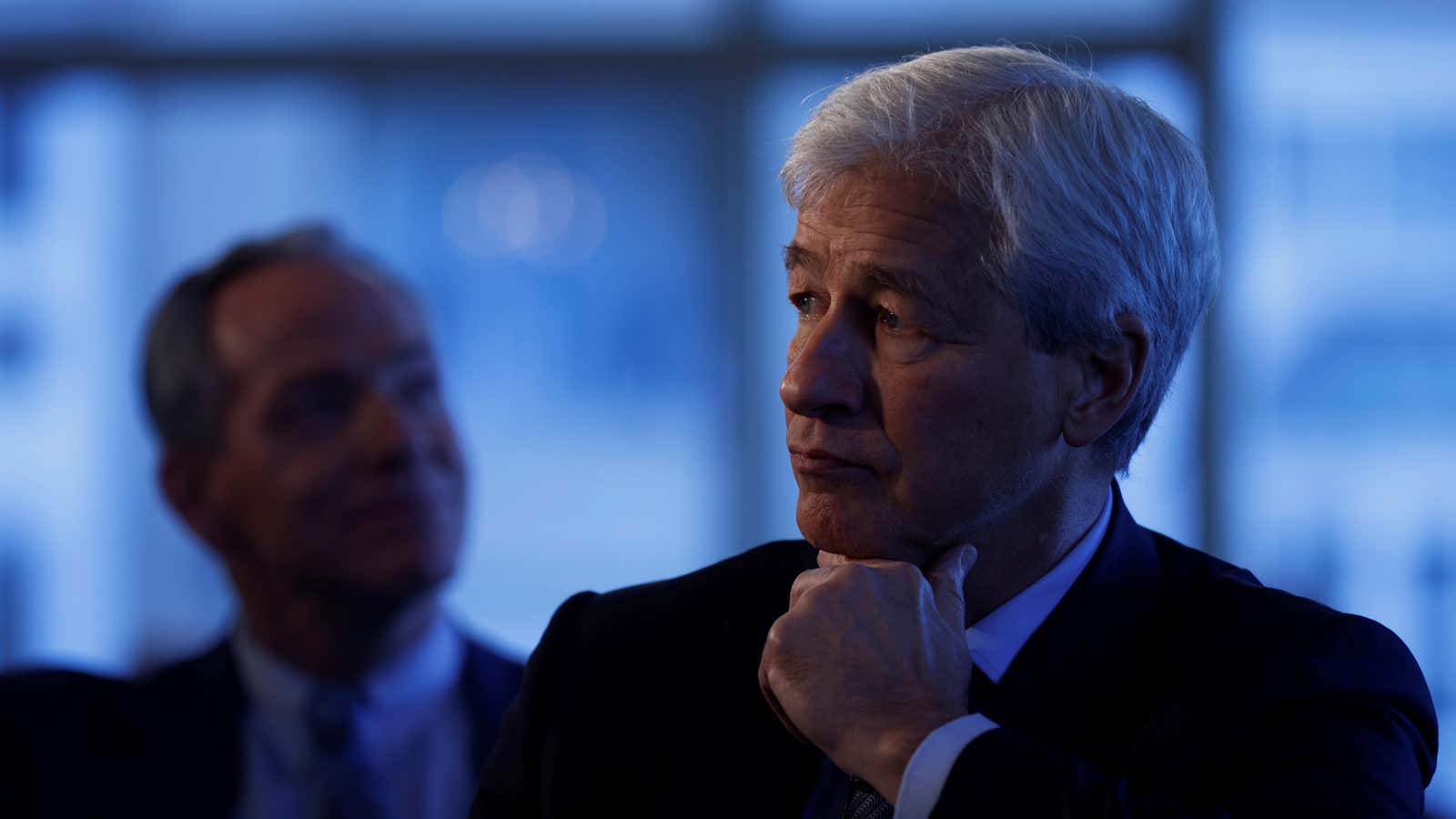 JP Morgan CEO Jamie Dimon listens as he is introduced at the Boston College Chief Executives Club luncheon in Boston, Massachusetts, U.S., November 23, 2021.    REUTERS/Brian Snyder