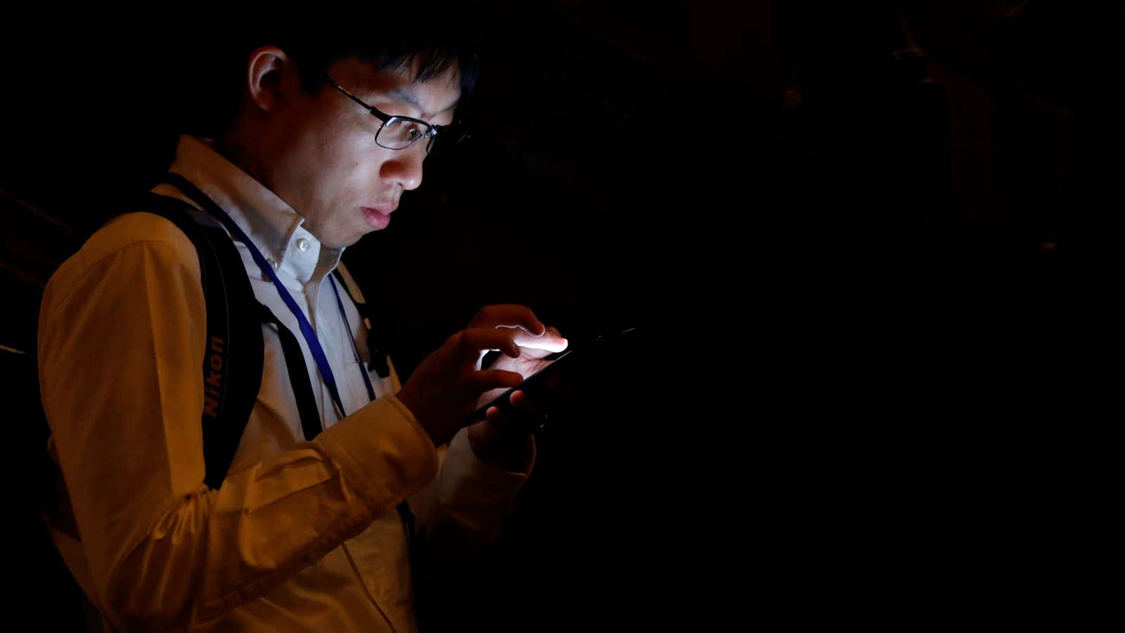 A guest uses a smartphone as he attends a new Galaxy Note 8 launch event in New York City, U.S., August 23, 2017. REUTERS/Brendan McDermid