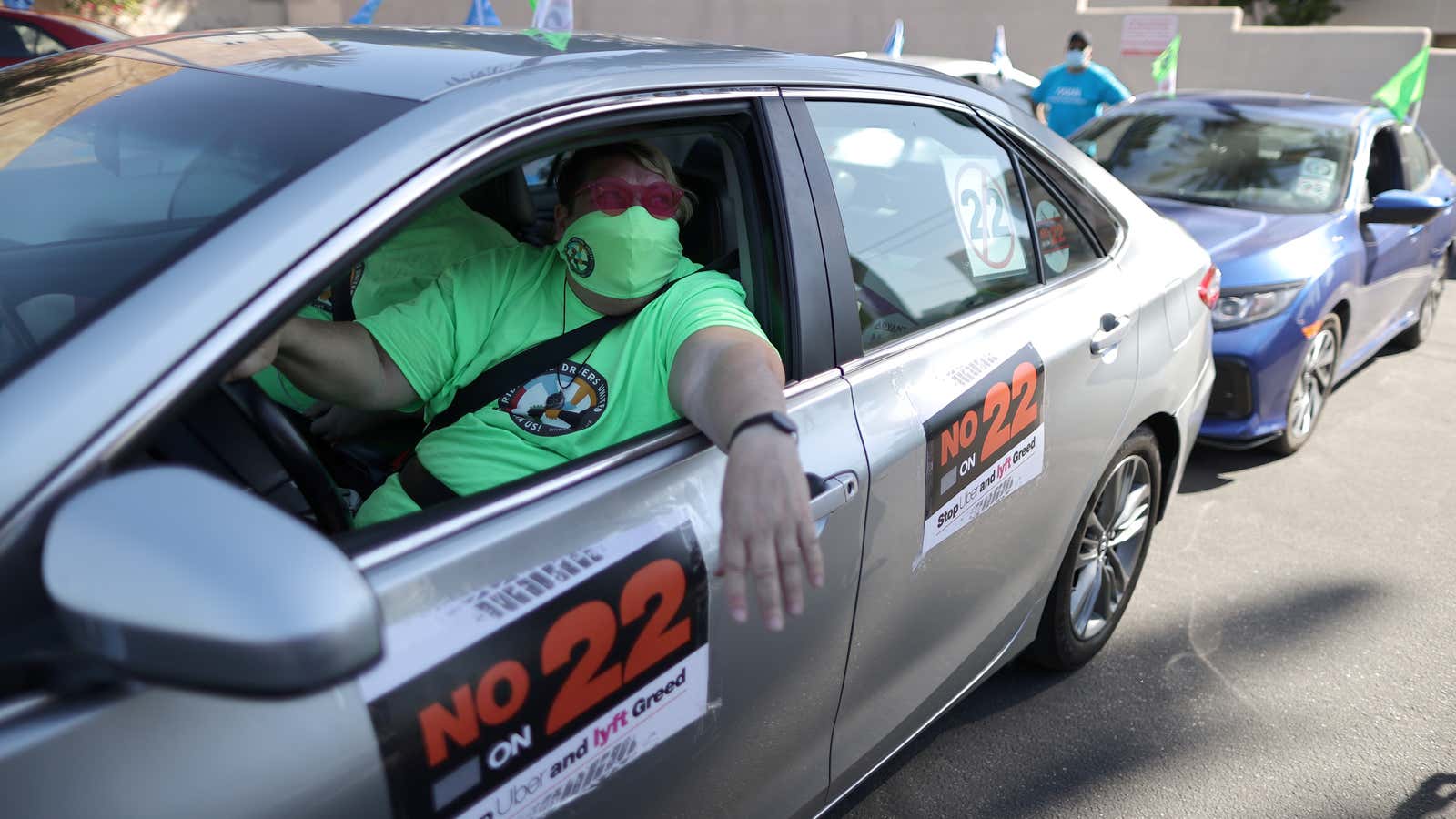 Tammie Jean Lane, 61, joins a protest by Uber and Lyft rideshare drivers against California Proposition 22 that would classify app-based drivers as independent contractors…