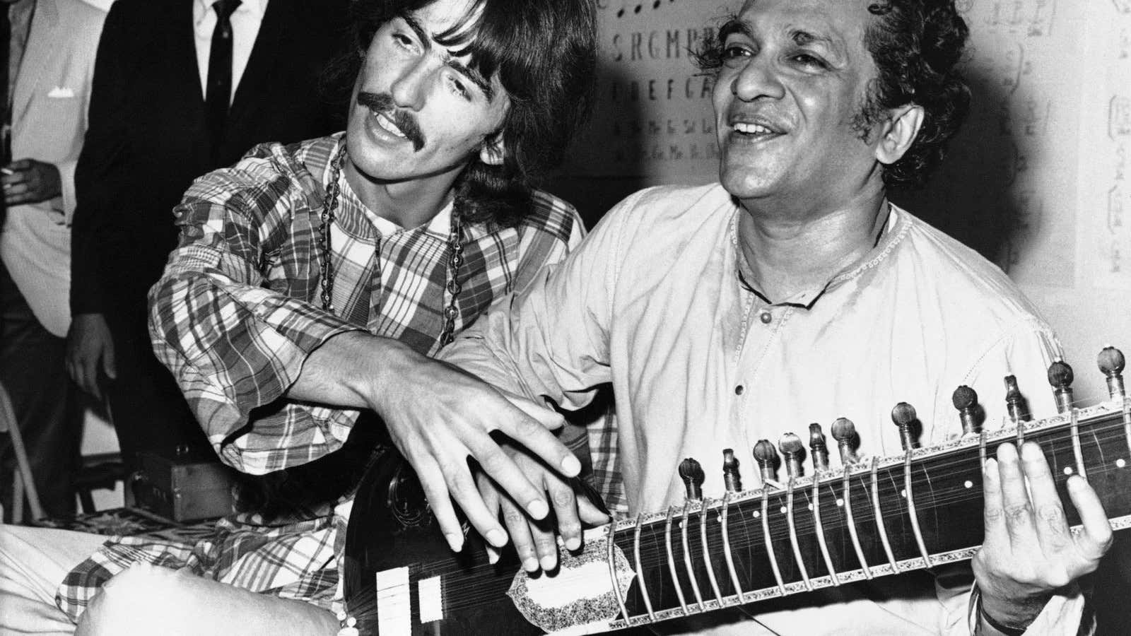 George Harrison with his musical mentor Ravi Shankar.