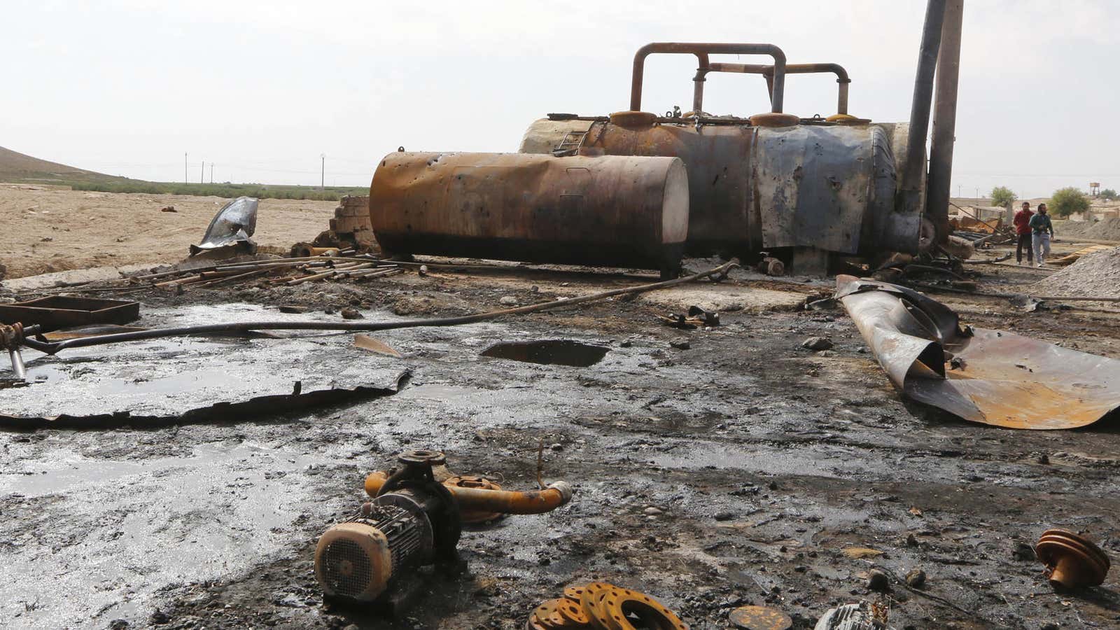 A former ISIL oil refinery in Syria, after a US air strike.