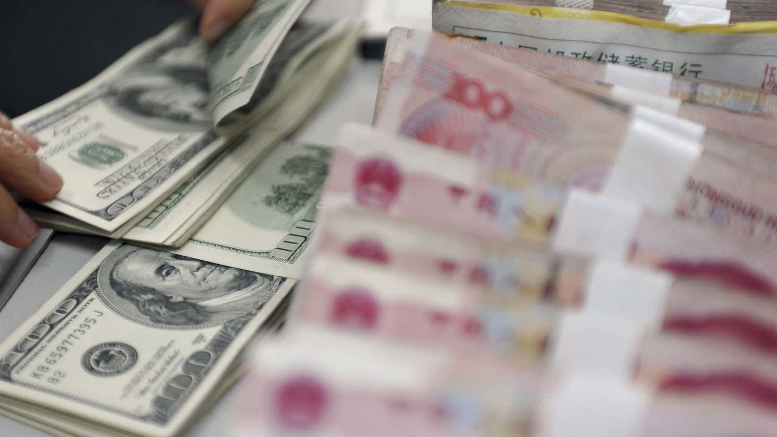 China has yet to give up its dollar-buying binge.