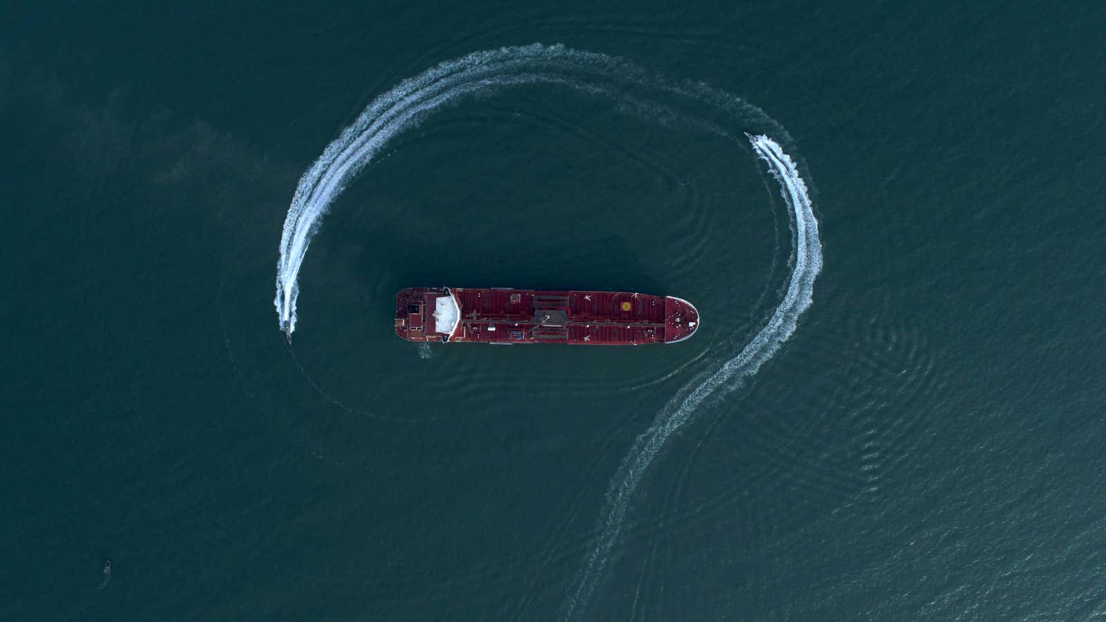 A speedboat operated by Iran’s Revolutionary Guard circles the British-flagged oil tanker Stena Impero.