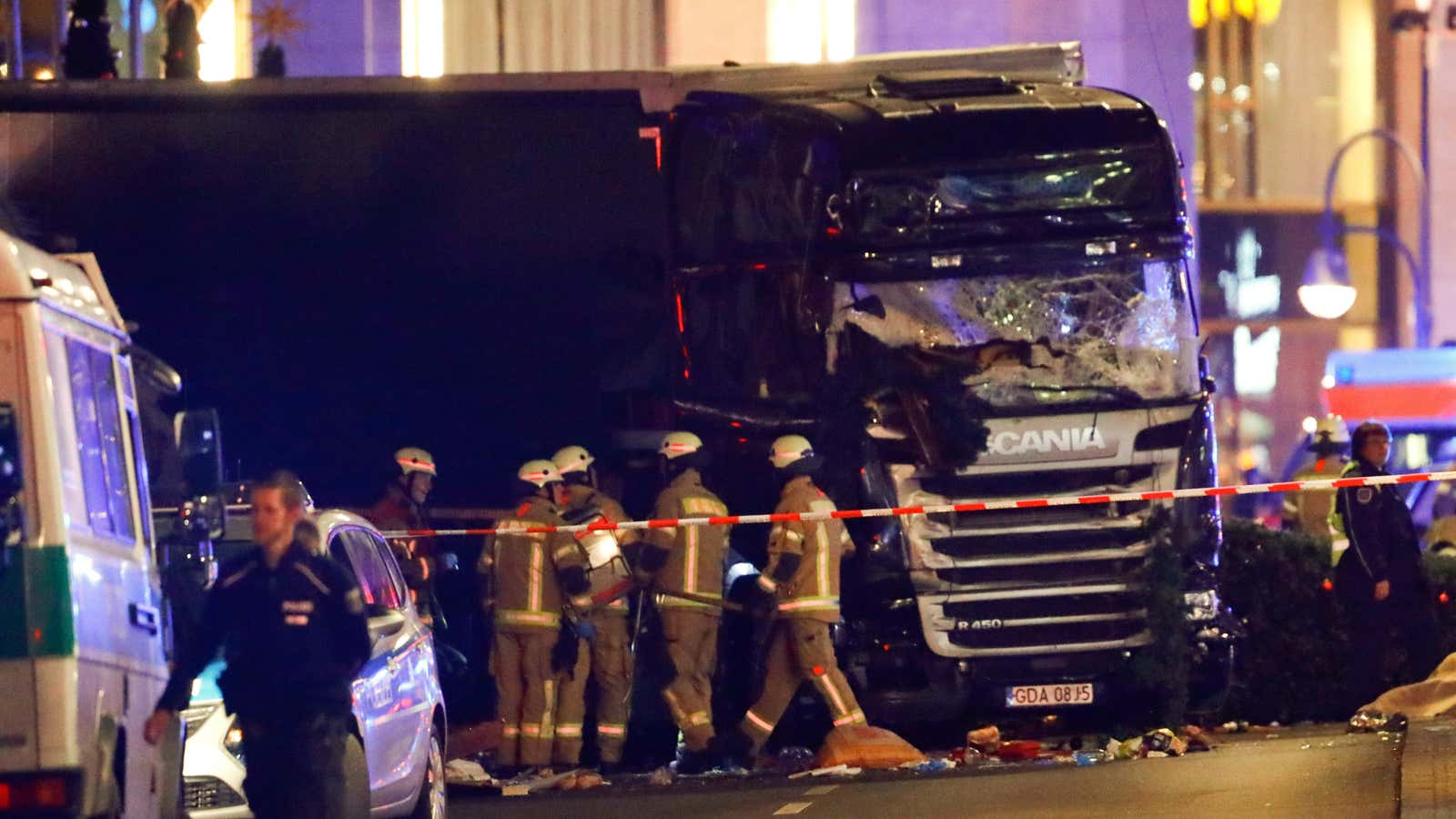 Emergency workers cordon off the truck that drove into the Gedächtniskirche Christmas market in Berlin