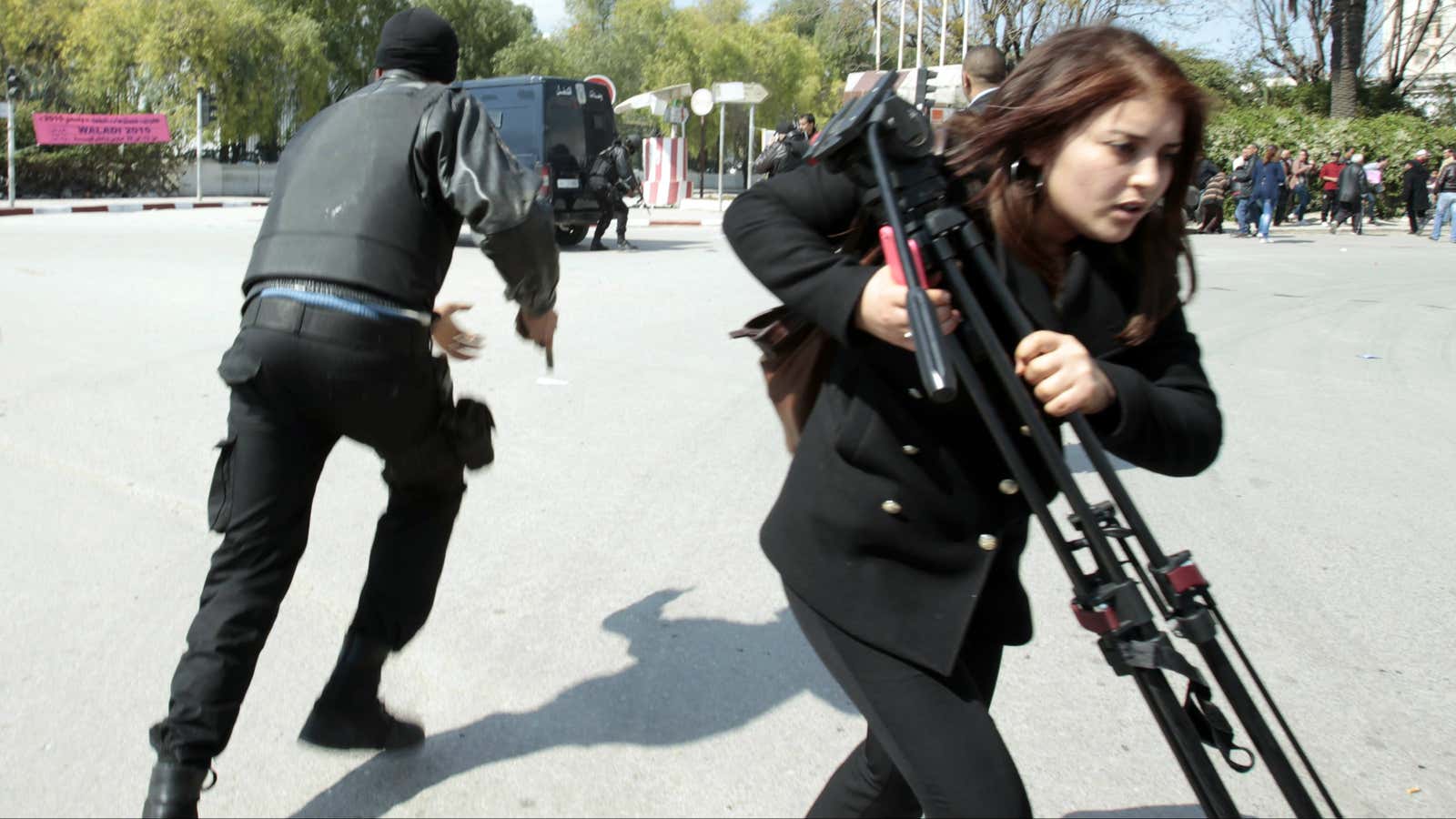 Running for cover in Tunis.