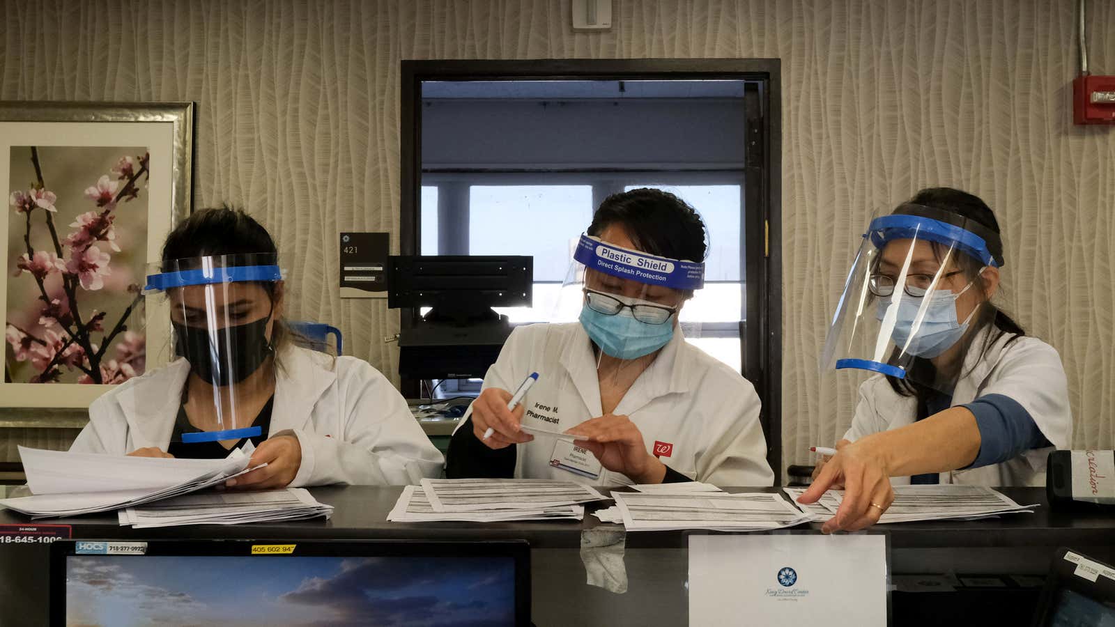 Pharmacists prepare to vaccinate nursing home residents in New York City.