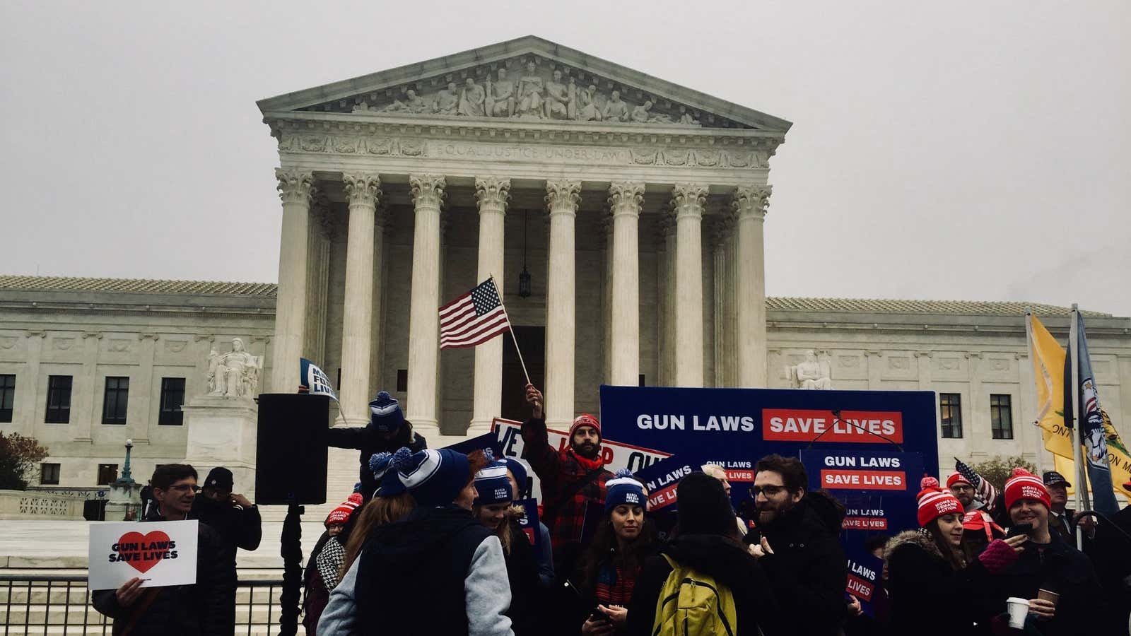 Braving the rain in the name of the law.