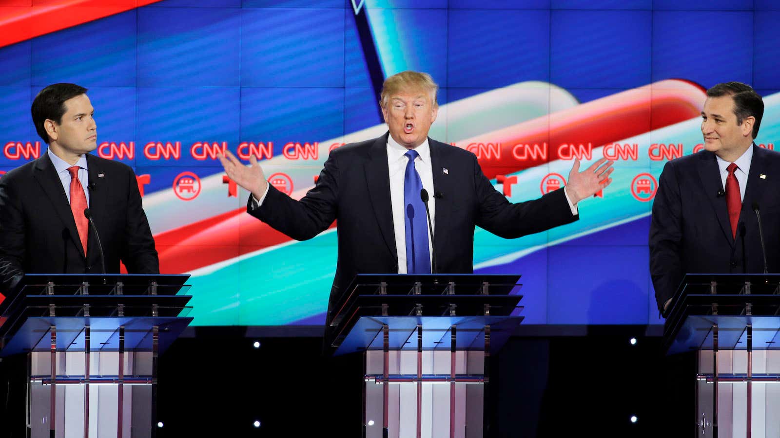 Republican presidential candidate, businessman Donald Trump, center, speaks as Republican presidential candidate, Sen. Marco Rubio, R-Fla., left, and Republican presidential candidate, Sen. Ted Cruz, R-Texas,…