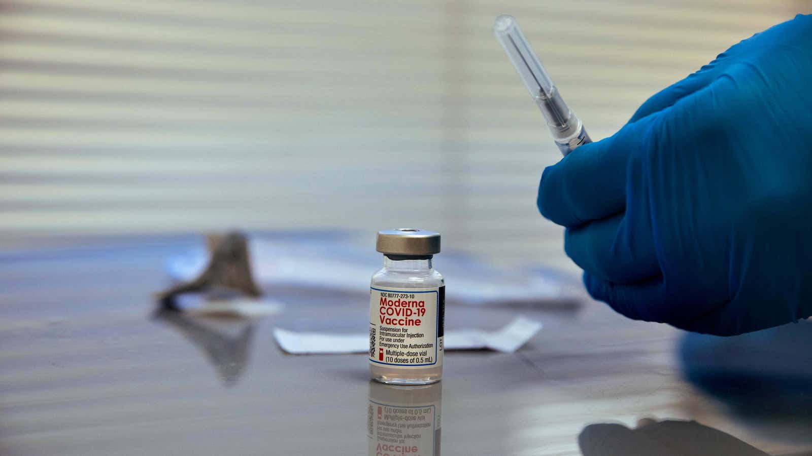 Nurse Andre McFarlane prepares a dose of the Moderna’s coronavirus disease (COVID-19) vaccine at the vaccination facility in the Bathgate Post Office, in the Bronx,…