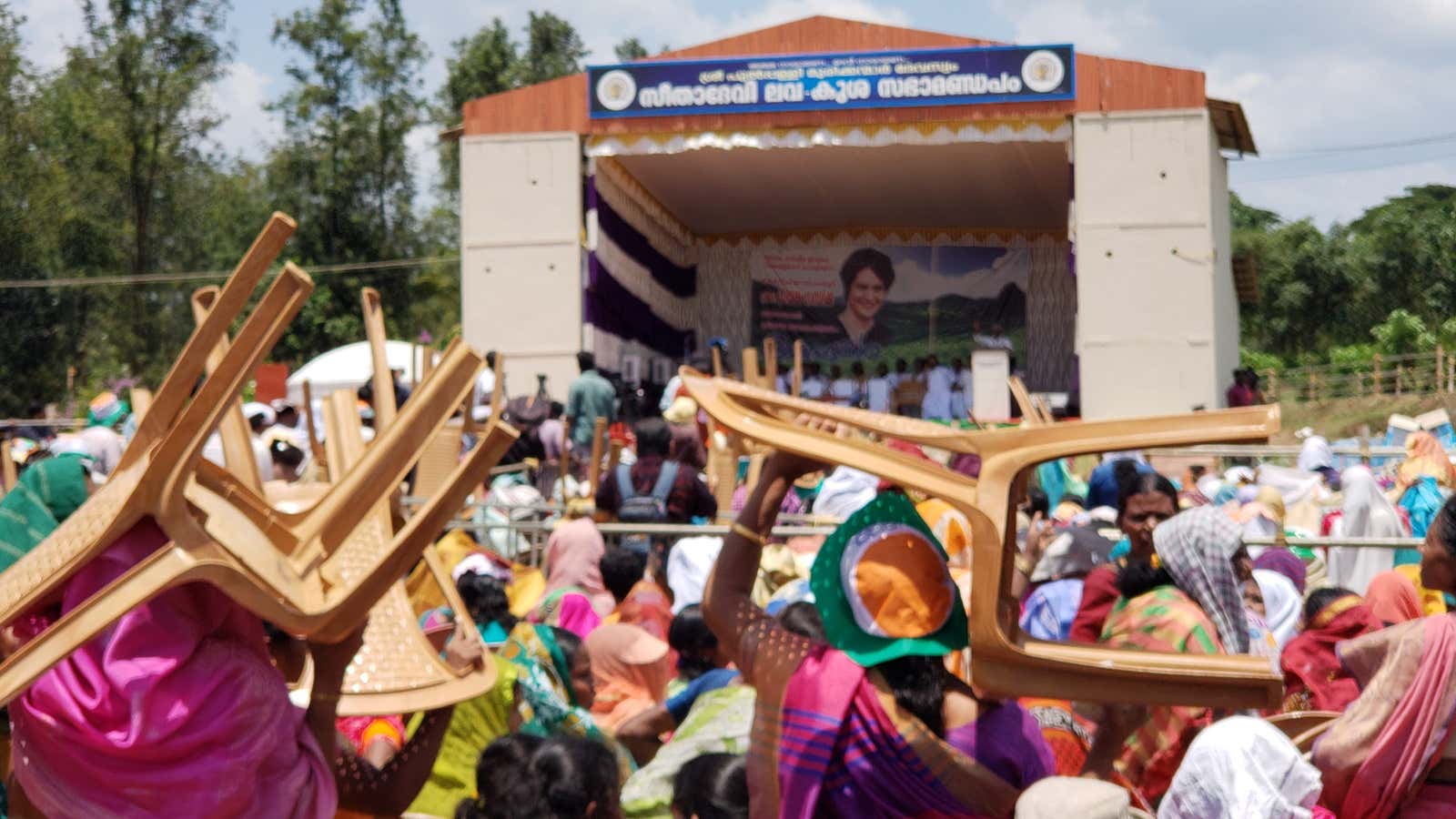 Women wait under the sun for Priyanka Gandhi in Pulpatty, Wayanad, on Apr. 21.