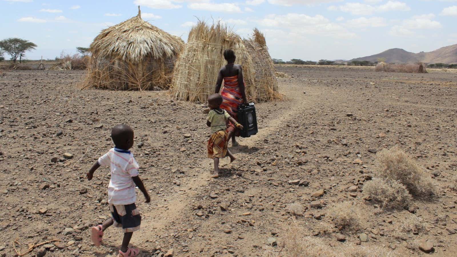 Carrying water in Kenya.