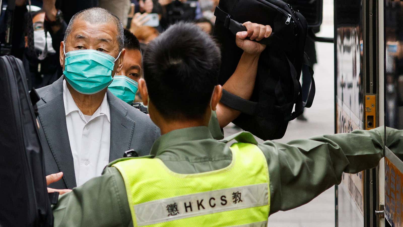 Media mogul Jimmy Lai, founder of Apple Daily, leaves the Court of Final Appeal by prison van in Hong Kong, China February 9, 2021. REUTERS/Tyrone…