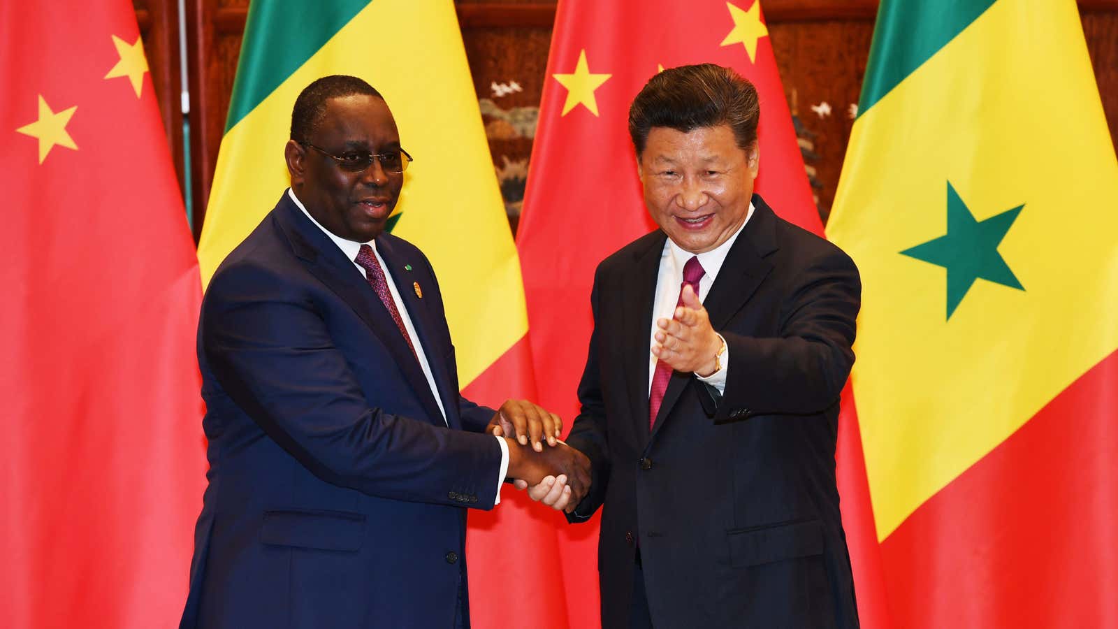 Chinese president Xi Jinping shakes hands with Senegalese president Macky Sall in 2016