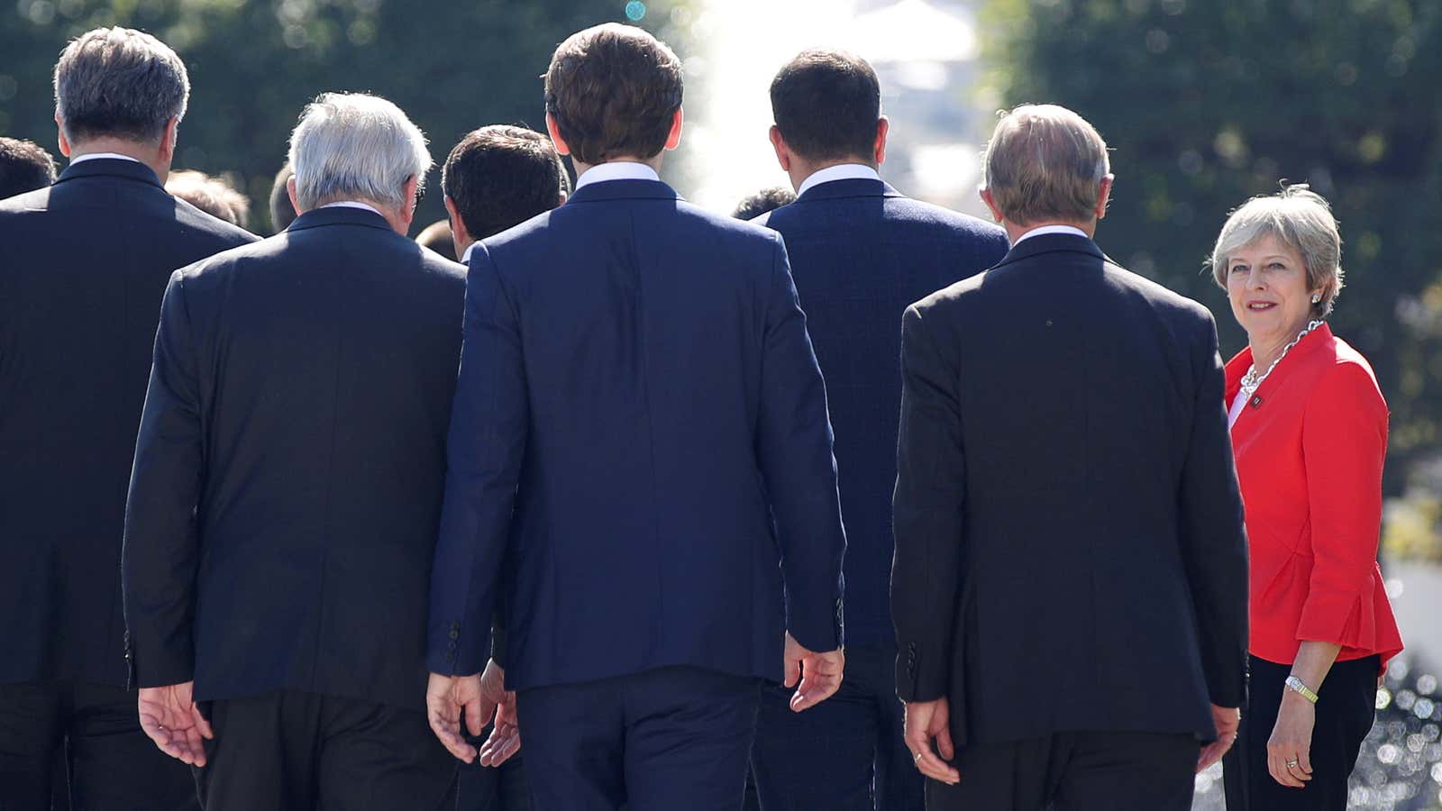 Theresa May arrives for a family photo during the European Union leaders informal summit in Salzburg, Austria.