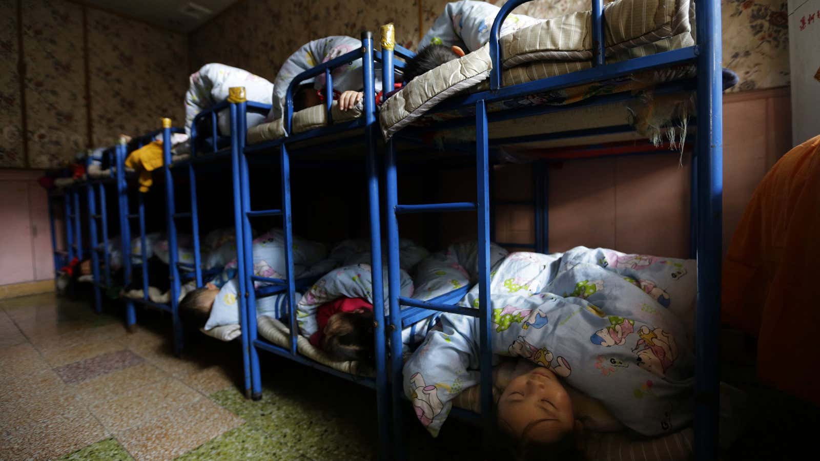 Children in a dormitory at a school for children of migrant workers on the outskirts of Beijing.