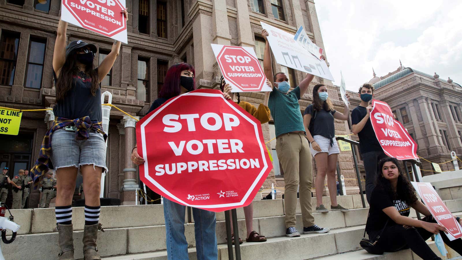 Voting rights activists protest against potential new voting restrictions in Austin, Texas.