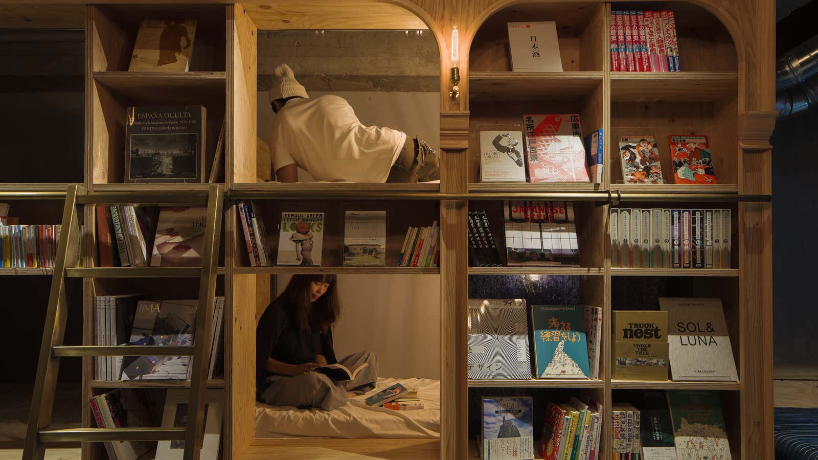 In Tokyo’s library-hotel, guests sleep in the bookshelves