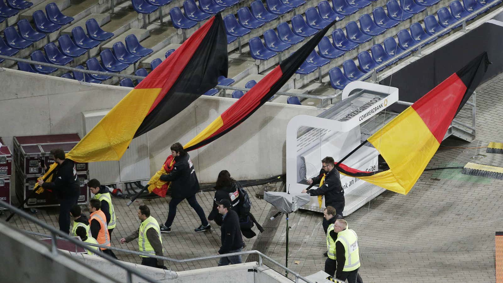 German flags are carried out of the stadium as the soccer friendly between Germany and the Netherlands was cancelled in Hannover, Germany.