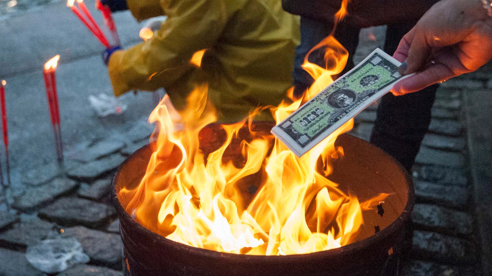 Burning money.