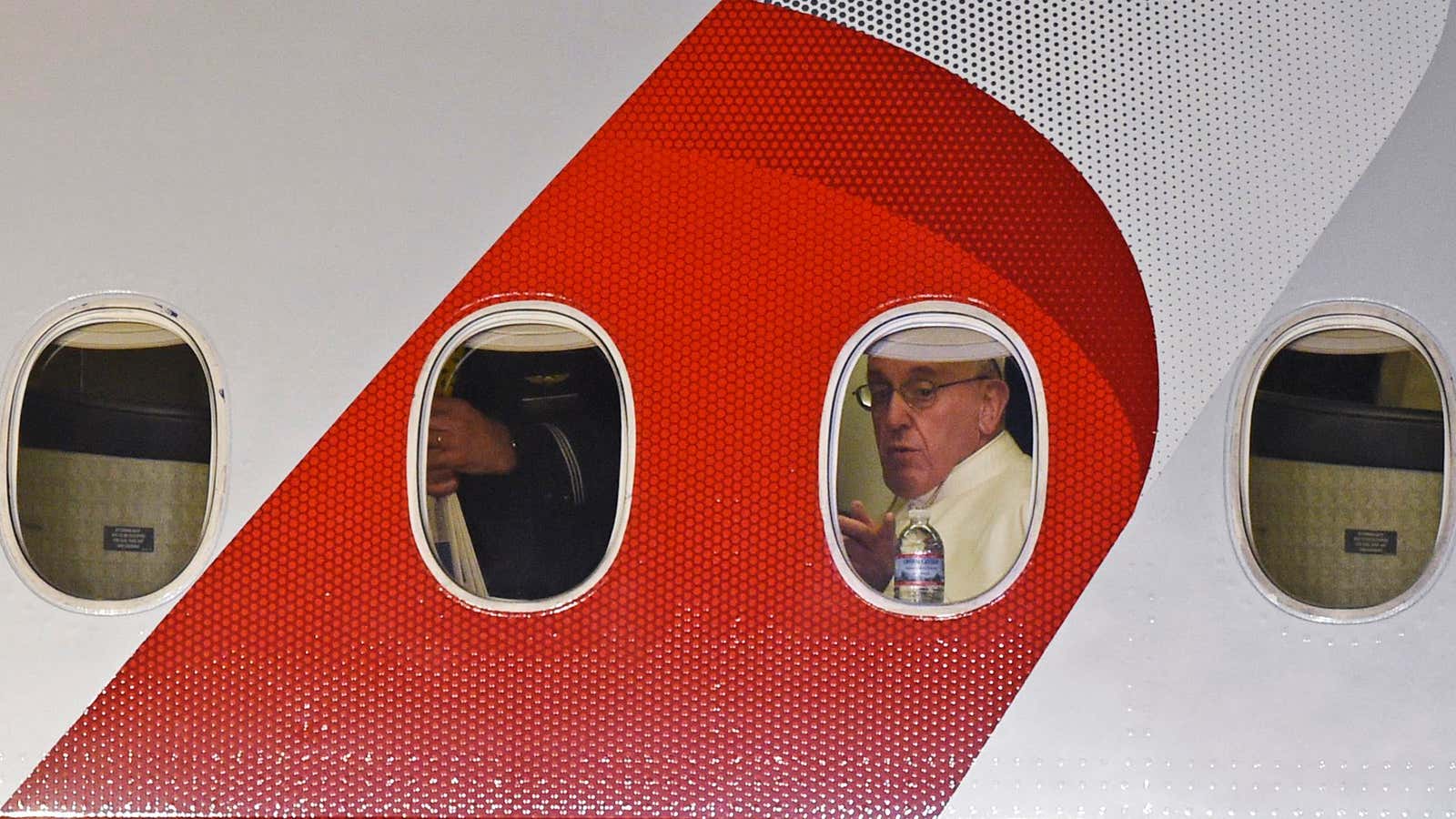 On the papal plane, bound for Italy, shortly before a final press conference on board.