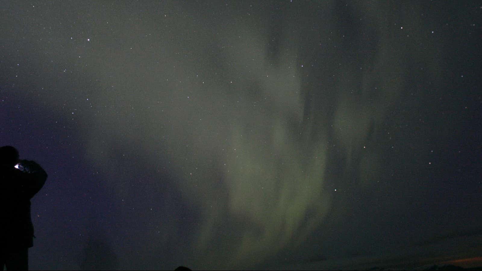 A view of Aurora Borealis lighting up the sky near Reykjavik in 2007.