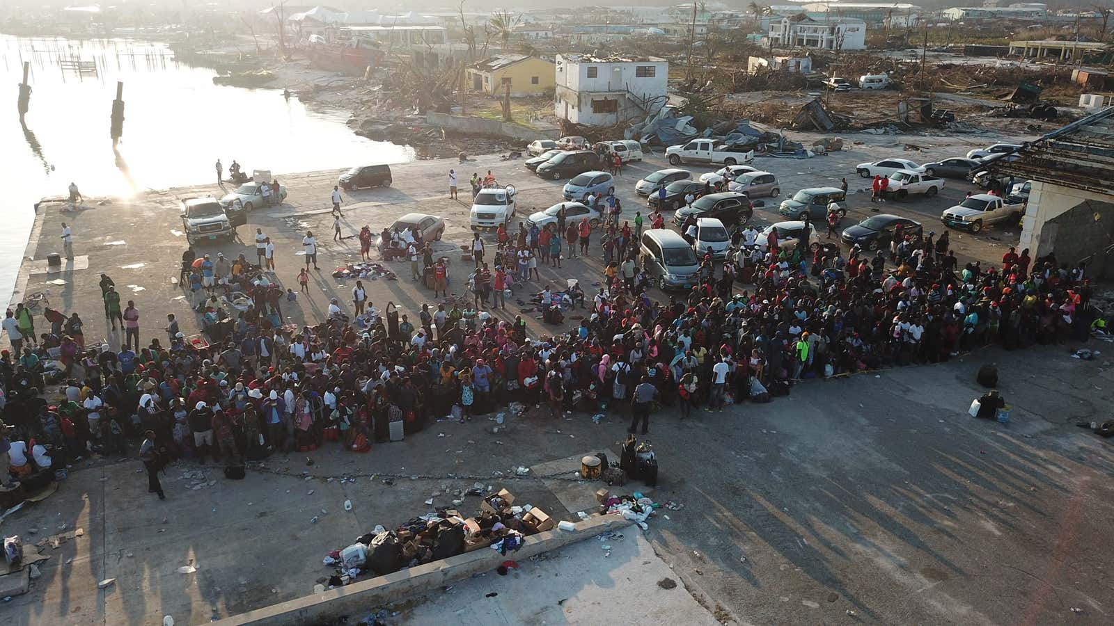 People in the Bahamas wait to be evacuated.