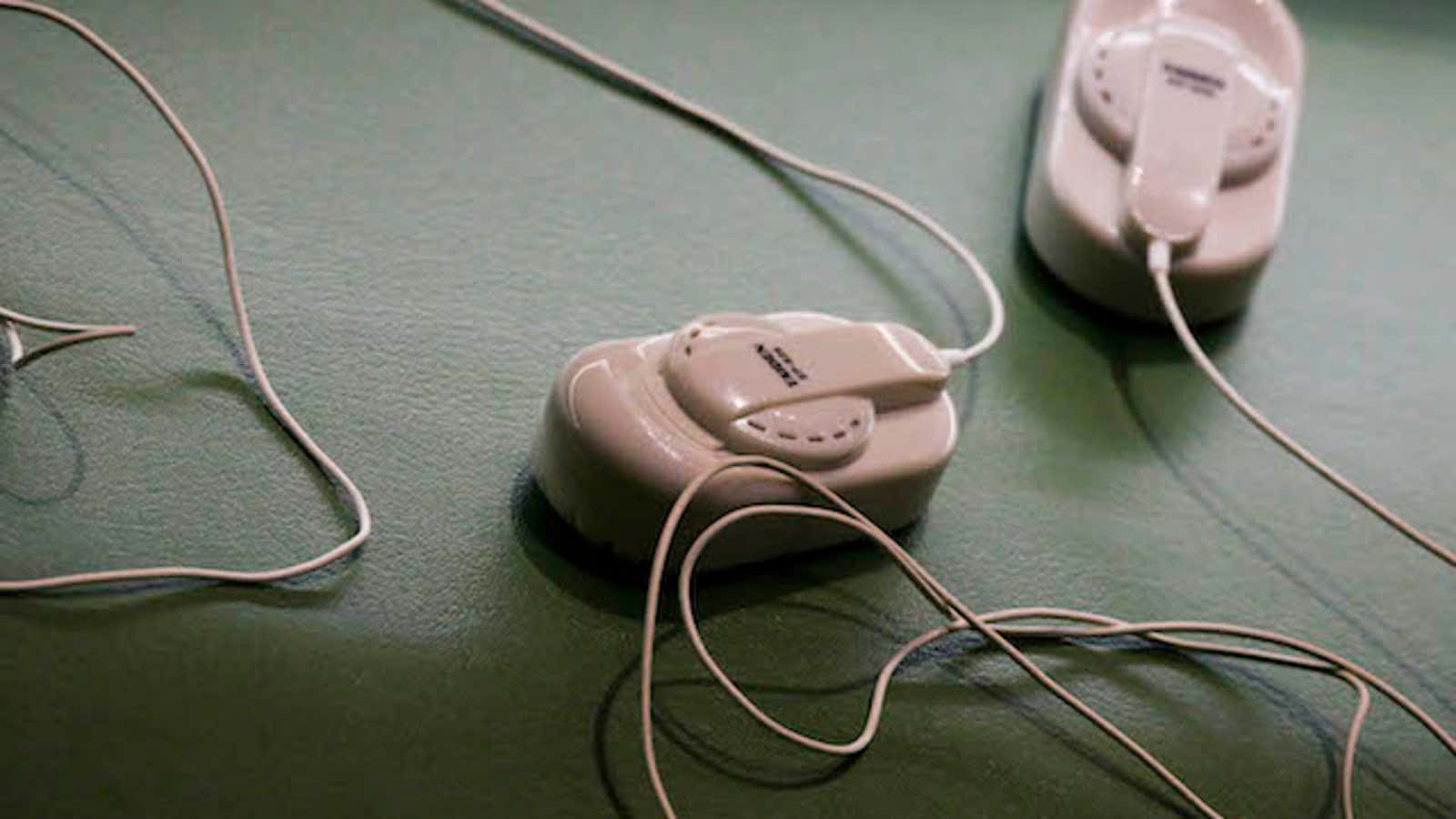 Devices used to listen to interpreters are seen on the desks of delegates during the 70th session of the United Nations General Assembly at the U.N. headquarters in New York, September 30, 2015.   REUTERS/Carlo Allegri – TB3EB9U1EHX93