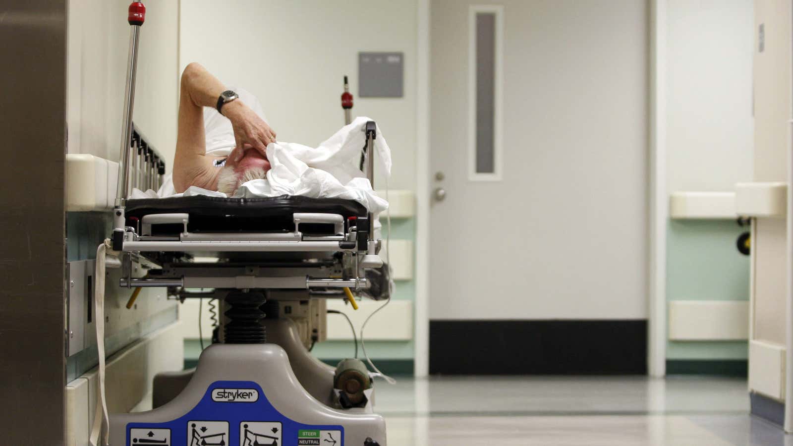 A patient waits in the hallway for a room to open up in the emergency room at Ben Taub General Hospital in Houston, Texas, July 27, 2009. Houston, the fourth-largest American city, is a case study in the extremes of the U.S. healthcare system.