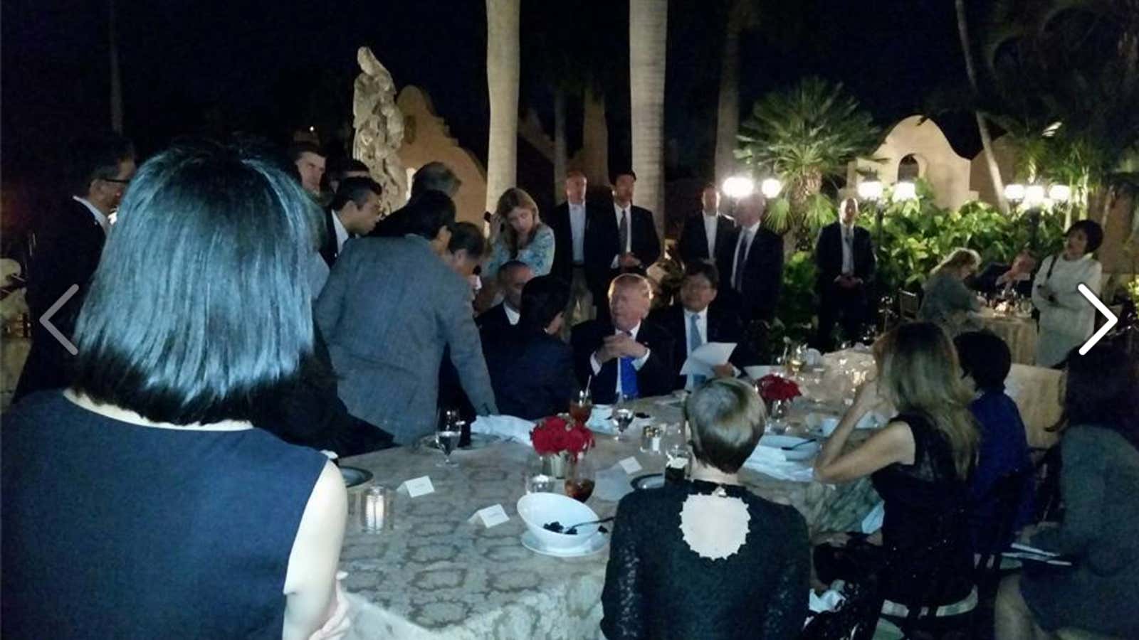 Donald Trump responded to North Korea’s missile test in a room full of strangers with smartphones