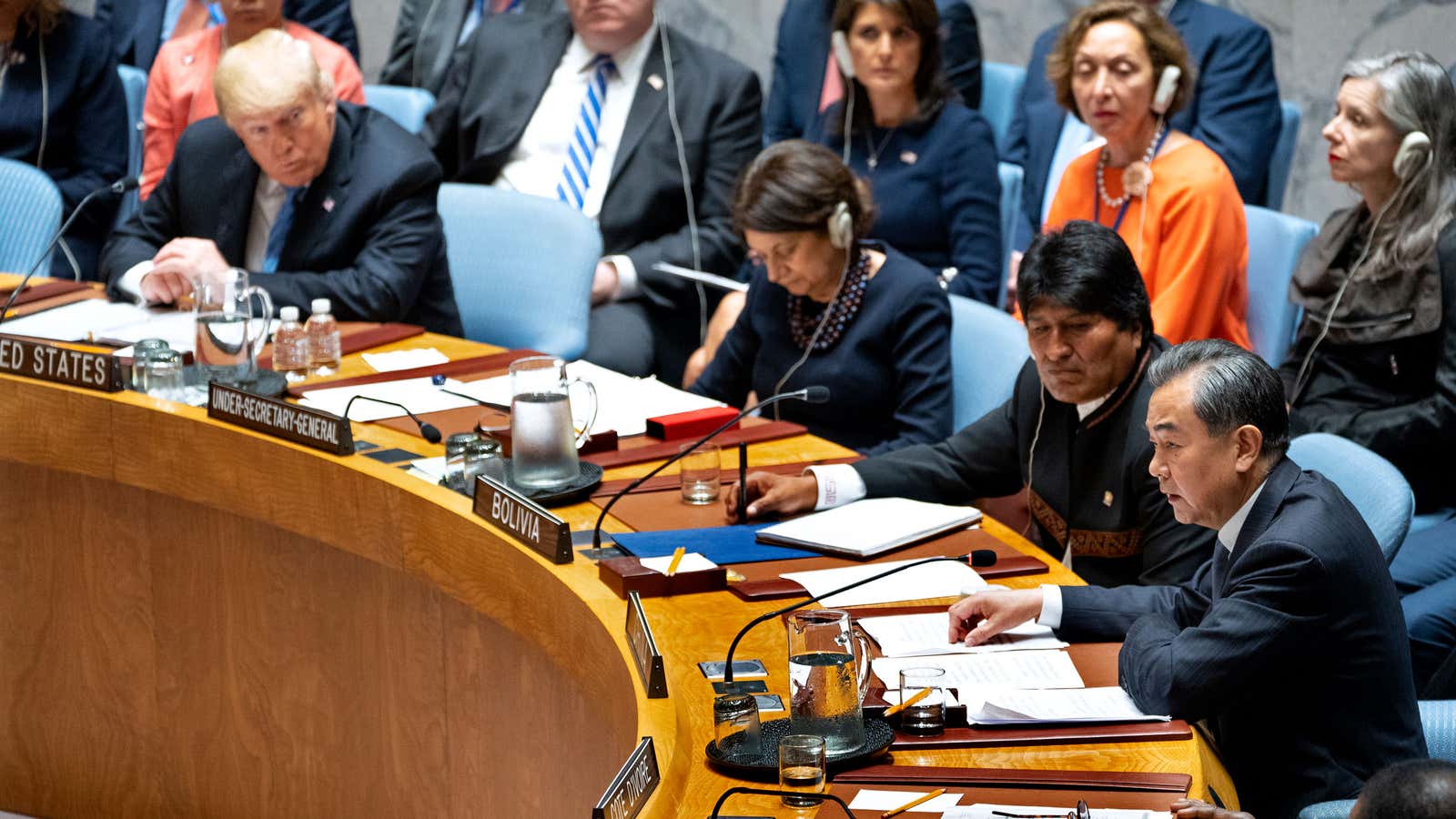 Trump listens to Chinese Foreign Minister Wang Yi at United Nations Security Council during the 73rd session of the United Nations General Assembly.