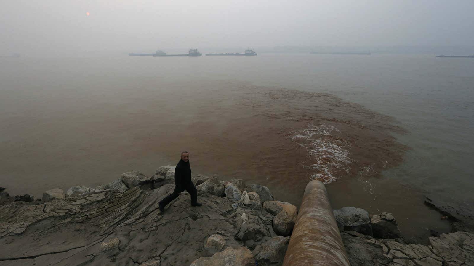 A paper mill dumps waste into the Yangtze River in Anhui province.