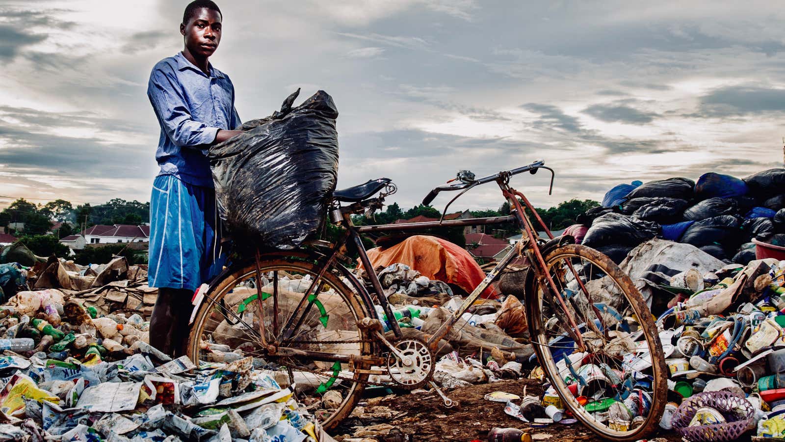 Taking out the trash in Uganda.