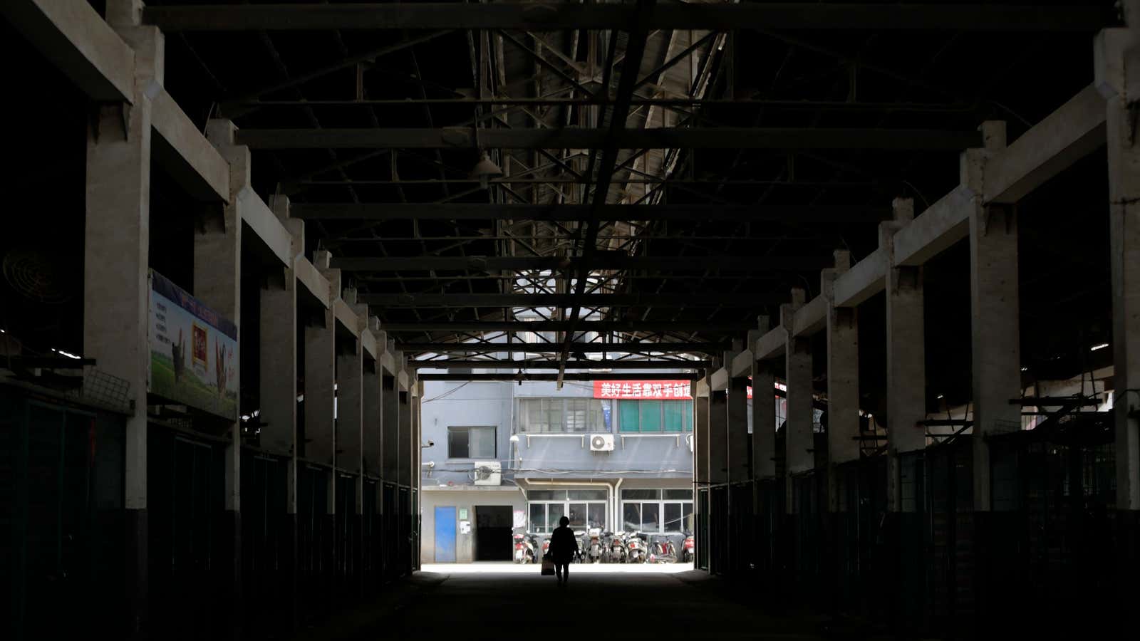 An empty live poultry market in Shanghai. China has banned sales of live birds in several cities.