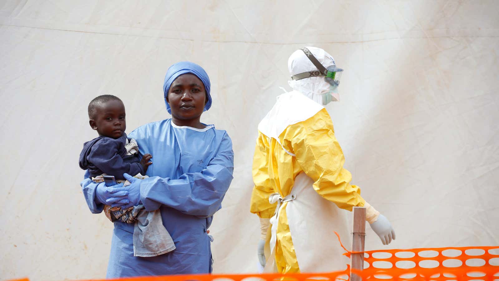 An Ebola survivor working as a caregiver to babies who are confirmed Ebola cases in Butembo, DR Congo,