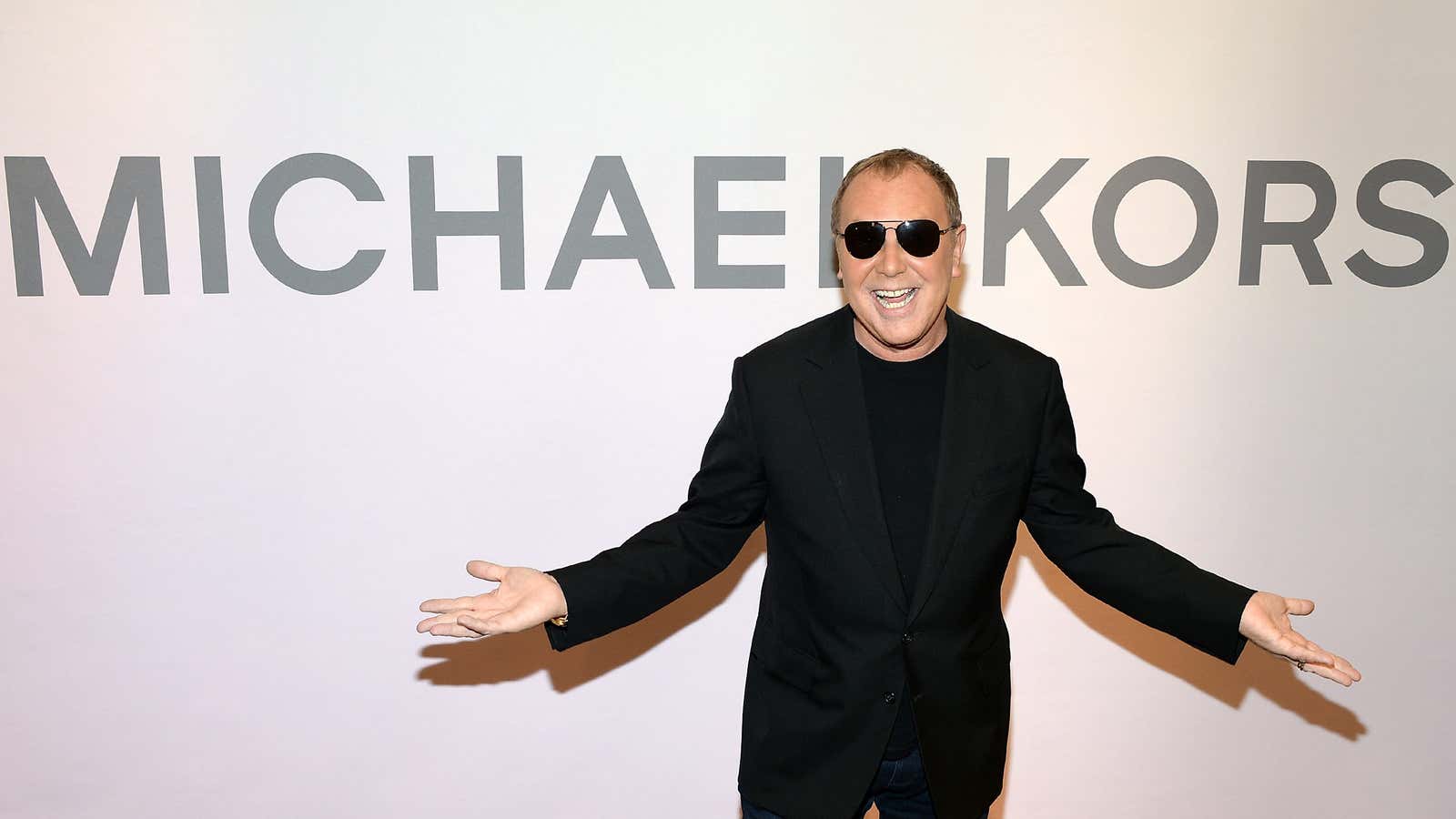 Why did michael discount kors buy jimmy choo