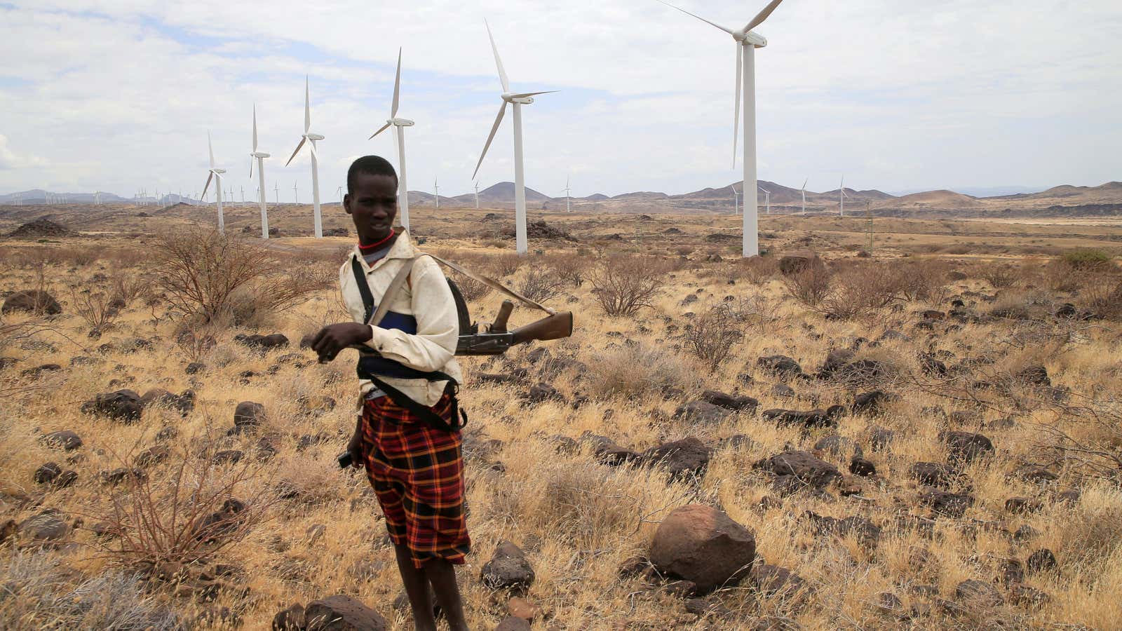 A Turkana goat herdboy with his gun near the Lake Turkana Wind Power project in Loiyangalani district, Marsabit County, northern Kenya, Sep. 4, 2018.