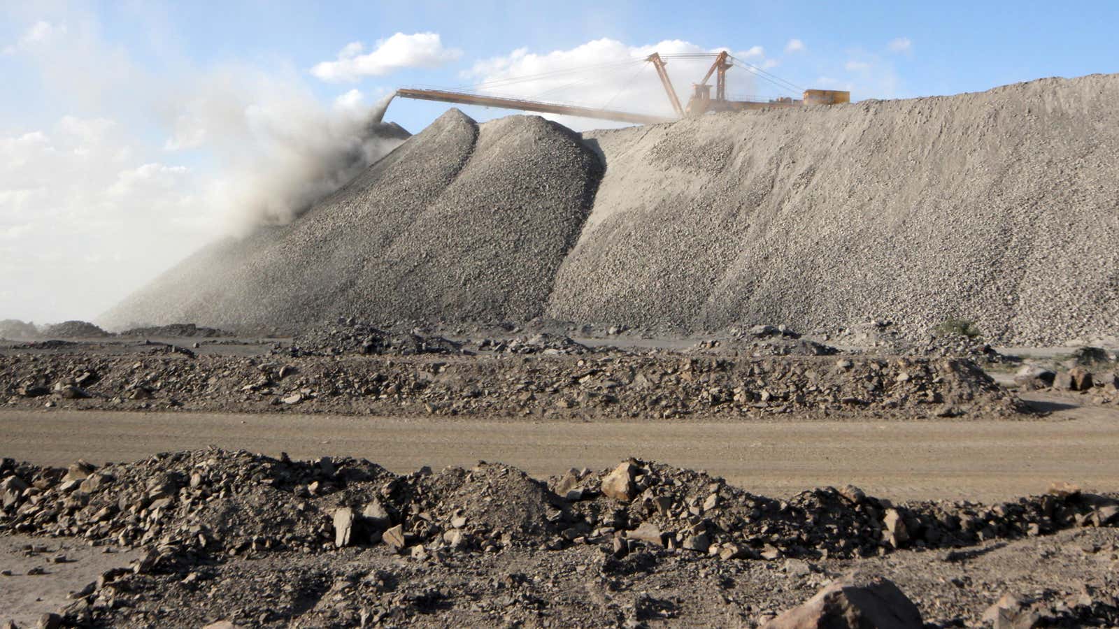 A mining machine is seen at the Bayan Obo mine containing rare earth minerals, in Inner Mongolia, China July 16, 2011. Picture taken July 16,…