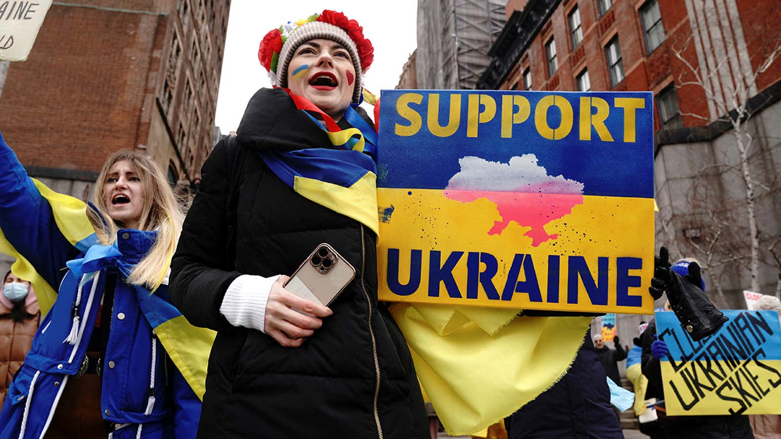 People protest outside the United Nations Headquarters against the Russia’s invasion of Ukraine, in Manhattan, New York City, U.S., March 1, 2022. REUTERS/Carlo Allegri