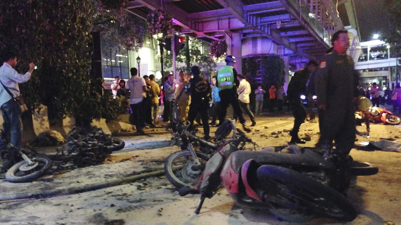 Motorcycles are strewn about after the explosion.