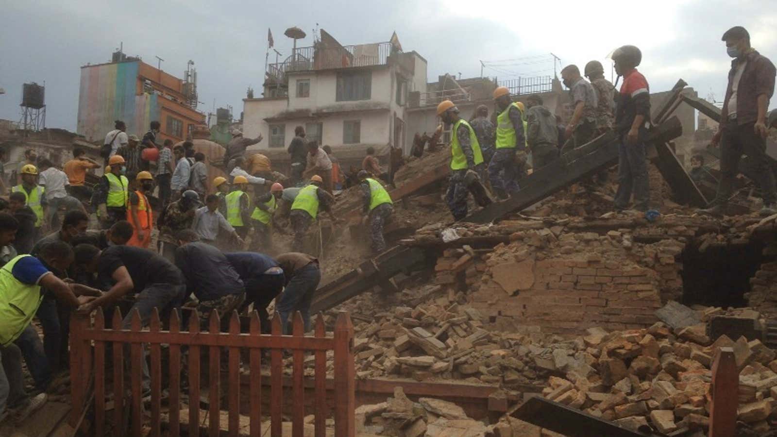 Rescuers clear debris in Kathmandu’s Durbar Square.