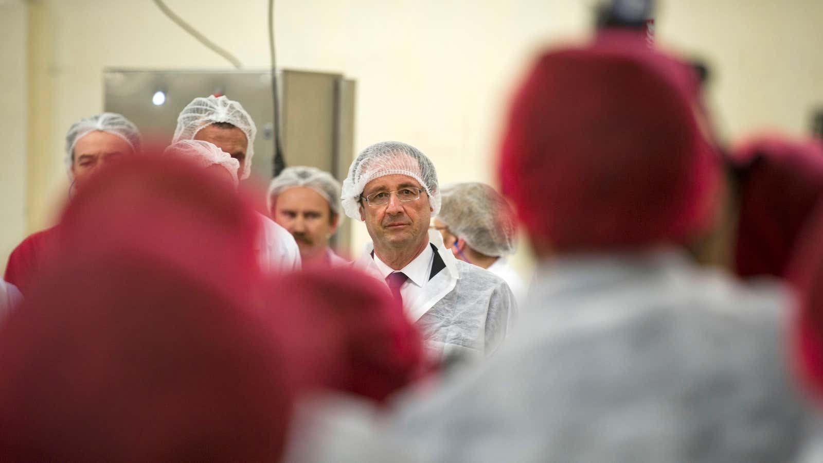 French president François Hollande inspecting a plant belong to Findus, the Swedish company implicated in the horse meat scandal, in March.