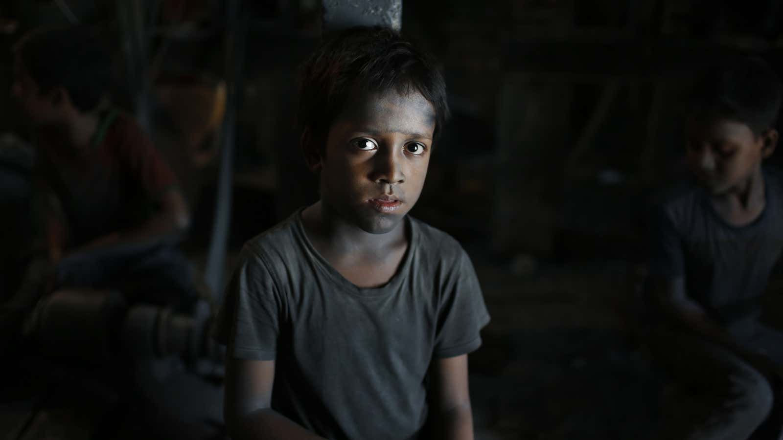 Ridoy, who is 7, works at a factory in Dhaka, Bangladesh, that makes metal utensils.