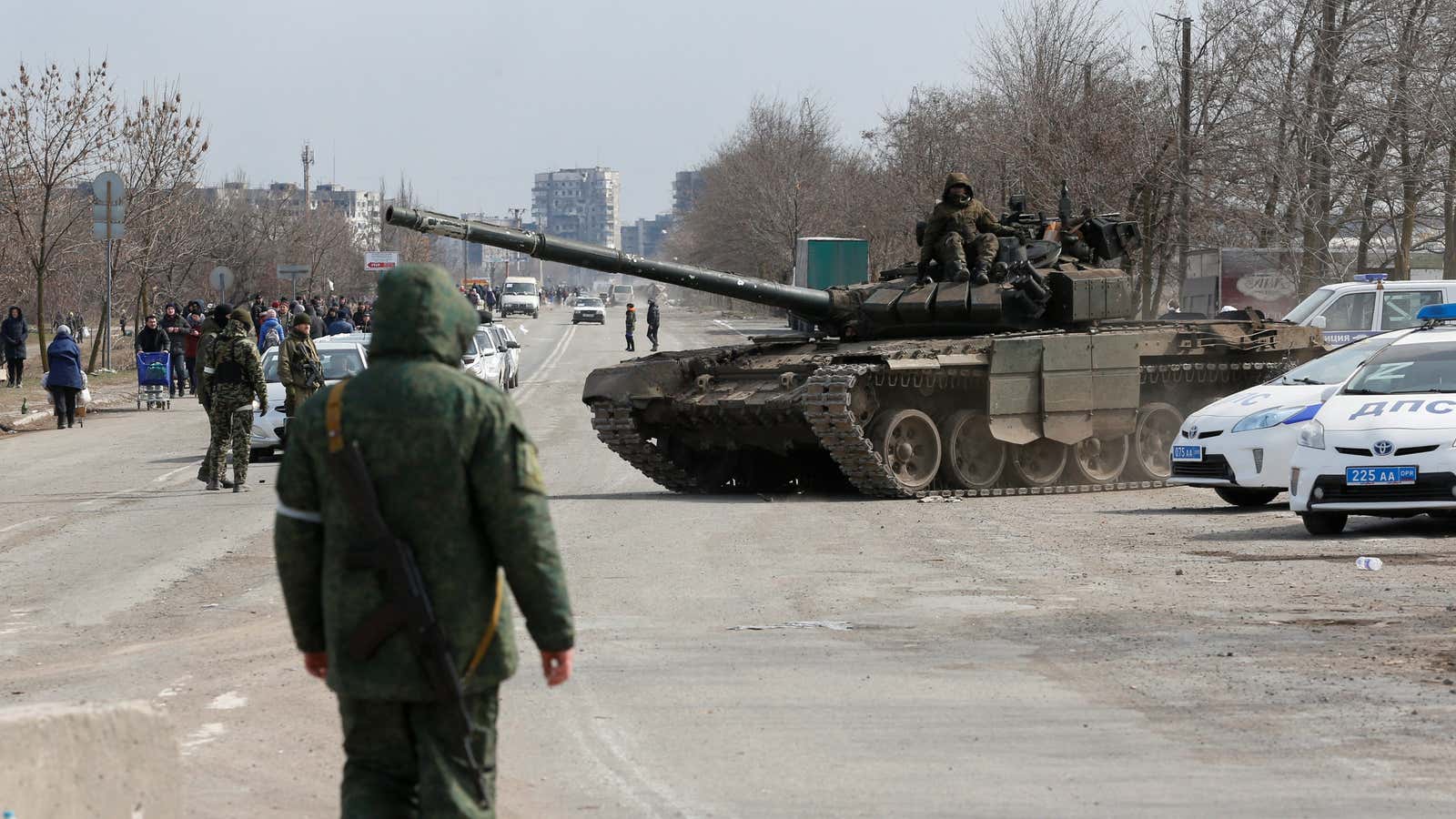 Service members of pro-Russian troops are seen atop of a tank during Ukraine-Russia conflict on the outskirts of the besieged southern port city of Mariupol, Ukraine.