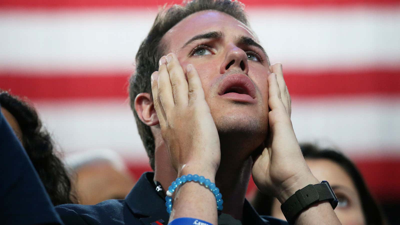 A supporter of Democratic U.S. presidential nominee Hillary Clinton reacts at the election night rally in New York.