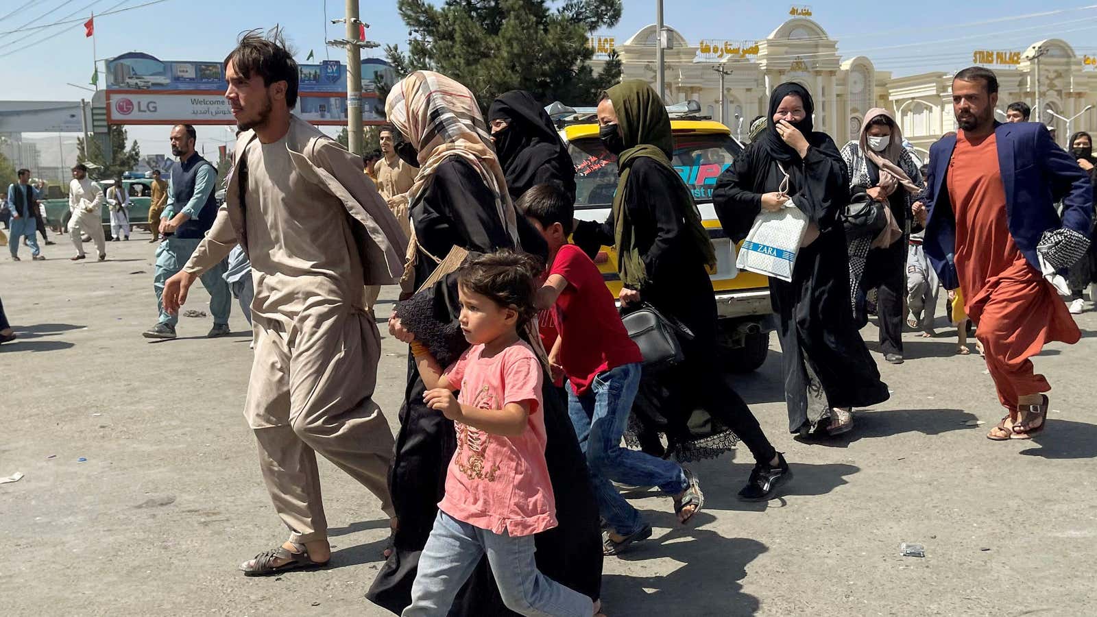 People trying to get into Kabul’s airport on Monday.