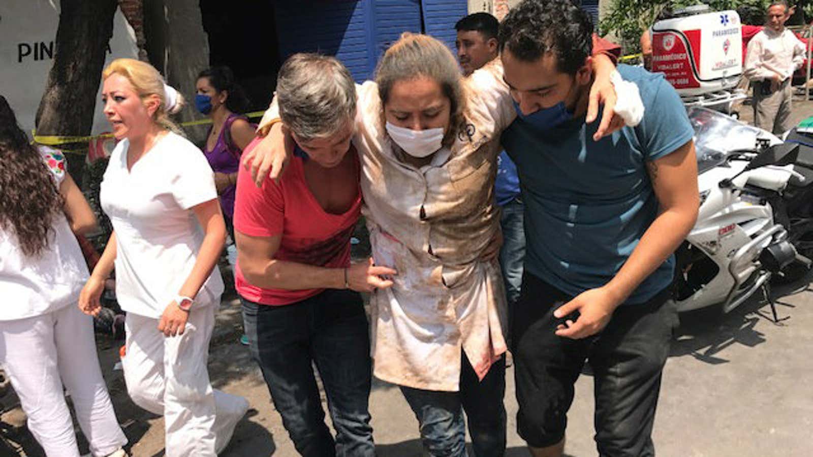 Throughout Mexico City, rescuer workers and residents dug through the rubble of collapsed buildings seeking survivors following the earthquake.