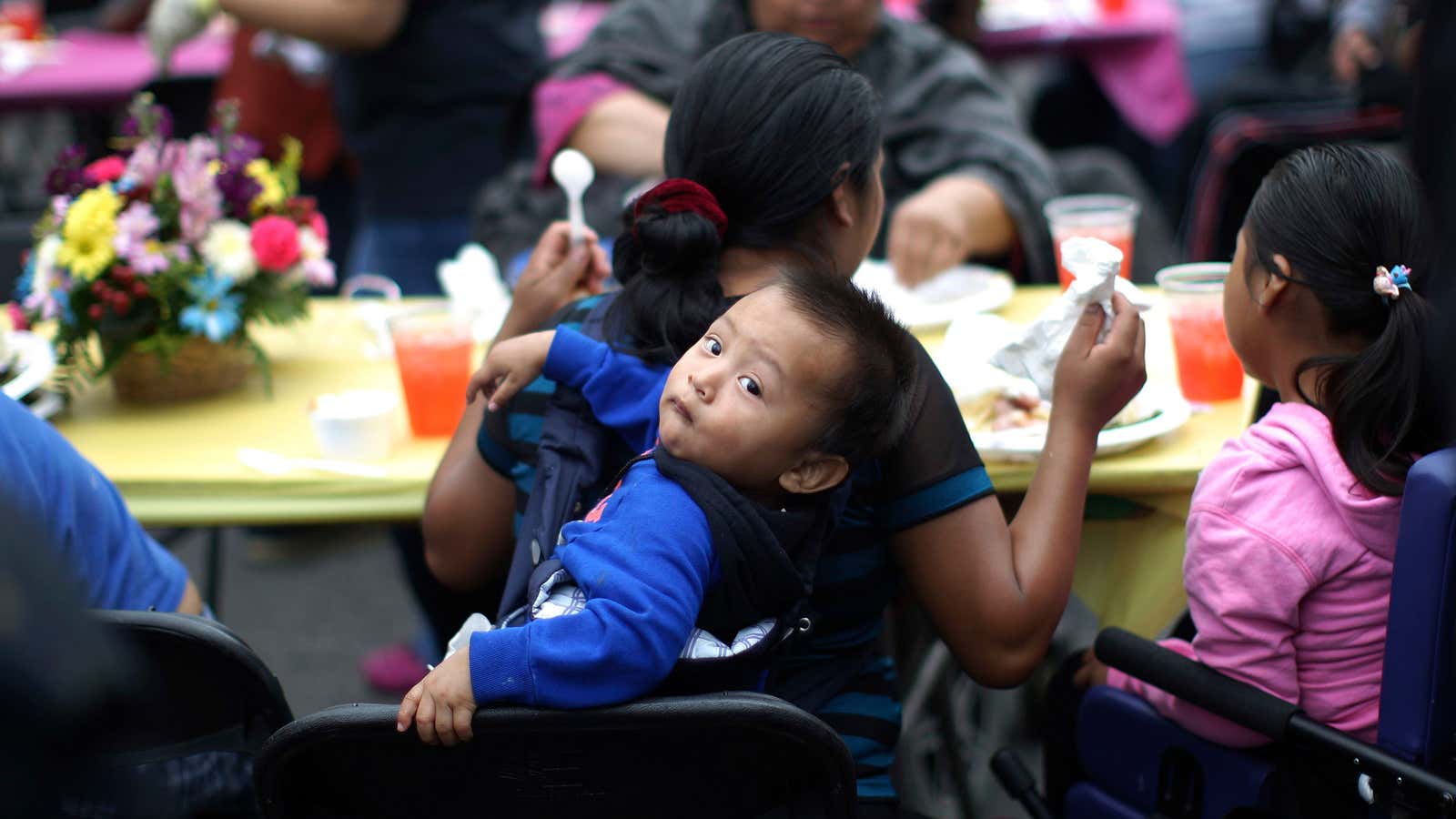 A child at a free Good Friday meal in Los Angeles, where the homeless population has risen since 2011.