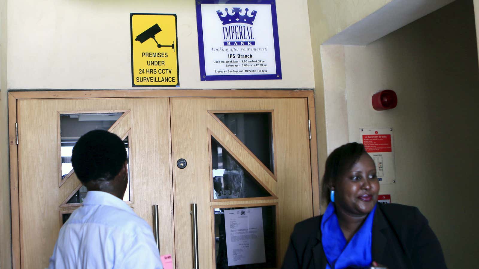 Imperial Bank customers arrive only to find the doors to closed Oct. 2015.