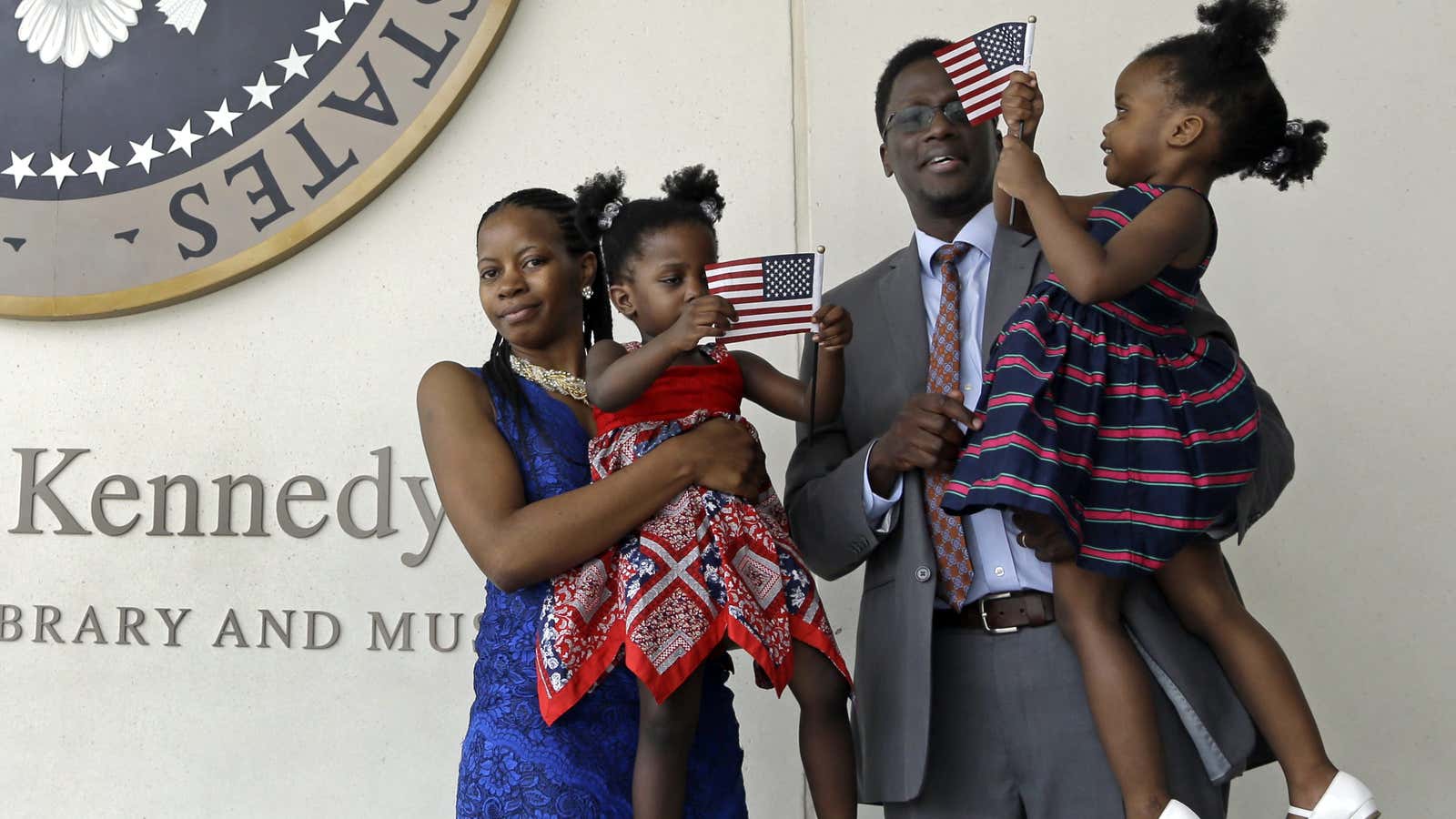 A Ugandan-American family celebrate becoming US citizens at a naturalization ceremony in Boston.